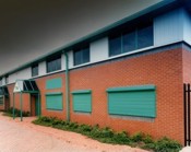 seceuroshield 3801 installed in green on a brick business building